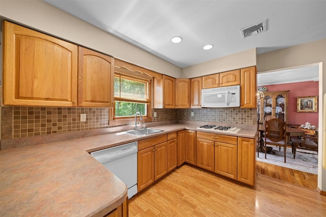 35 Capt Faldermeyer Dr, Stony Point, NY 10980 - kitchen featuring white appliances, a sink, light wood finished floors, light countertops, and recessed lighting