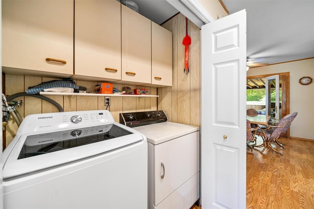 35 Capt Faldermeyer Dr, Stony Point, NY 10980 - laundry room with cabinet space, independent washer and dryer, and light wood finished floors