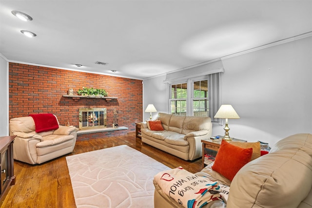 35 Capt Faldermeyer Dr, Stony Point, NY 10980 - living room featuring crown molding, wood finished floors, and a brick fireplace