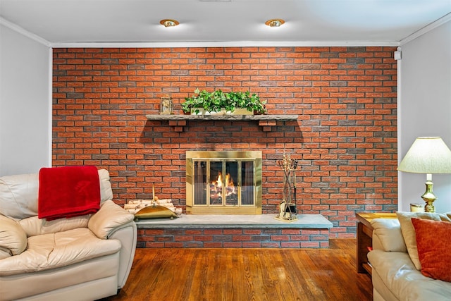 35 Capt Faldermeyer Dr, Stony Point, NY 10980 - living room with ornamental molding, brick wall, wood finished floors, and a brick fireplace