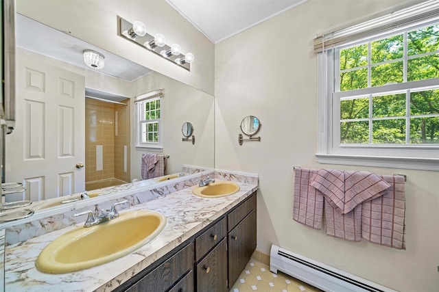 35 Capt Faldermeyer Dr, Stony Point, NY 10980 - bathroom featuring a baseboard heating unit, double vanity, baseboards, and a shower