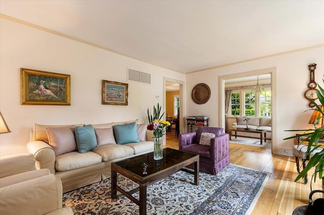 67 Walbrooke Rd, Scarsdale, NY 10583 - living room featuring light wood-style floors and ornamental molding