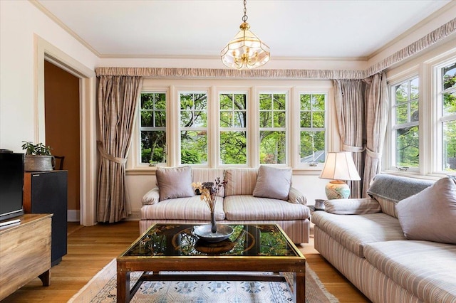67 Walbrooke Rd, Scarsdale, NY 10583 - living area featuring light wood-type flooring, crown molding, and a chandelier