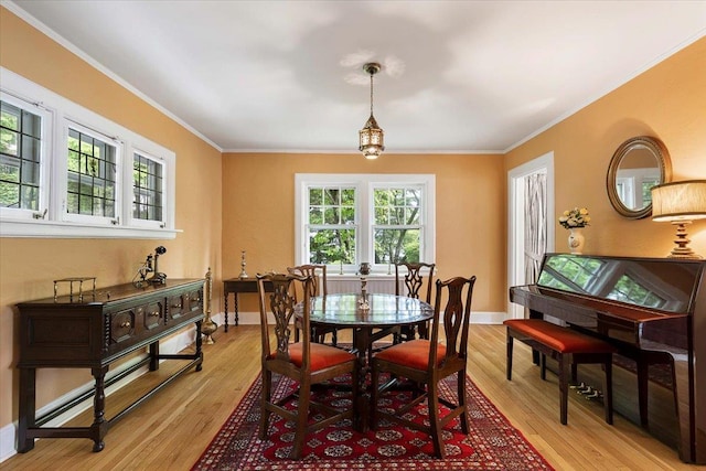 67 Walbrooke Rd, Scarsdale, NY 10583 - dining space with crown molding, light wood-style flooring, and baseboards
