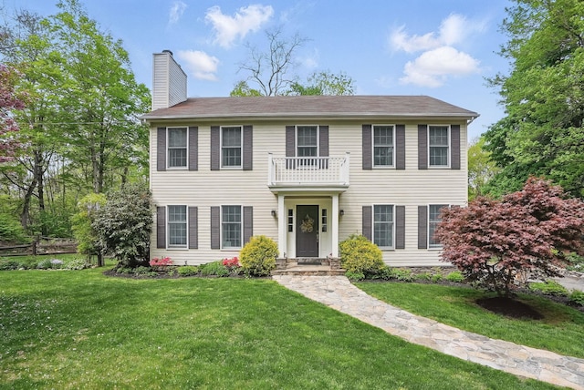 304 Church Rd, Putnam Valley, NY 10579 - colonial house with a chimney, a balcony, and a front yard