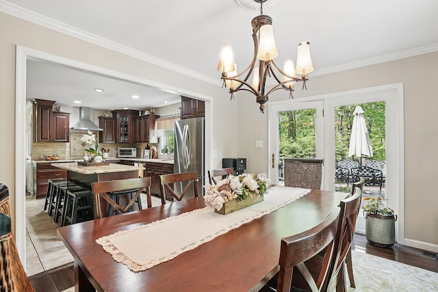304 Church Rd, Putnam Valley, NY 10579 - dining area featuring a chandelier, crown molding, and recessed lighting