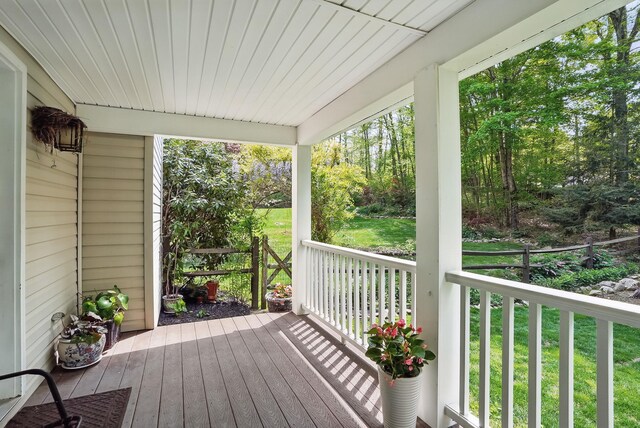 304 Church Rd, Putnam Valley, NY 10579 - wooden deck featuring covered porch