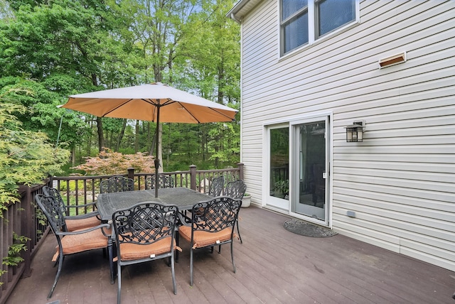 304 Church Rd, Putnam Valley, NY 10579 - wooden deck featuring outdoor dining area and view of scattered trees