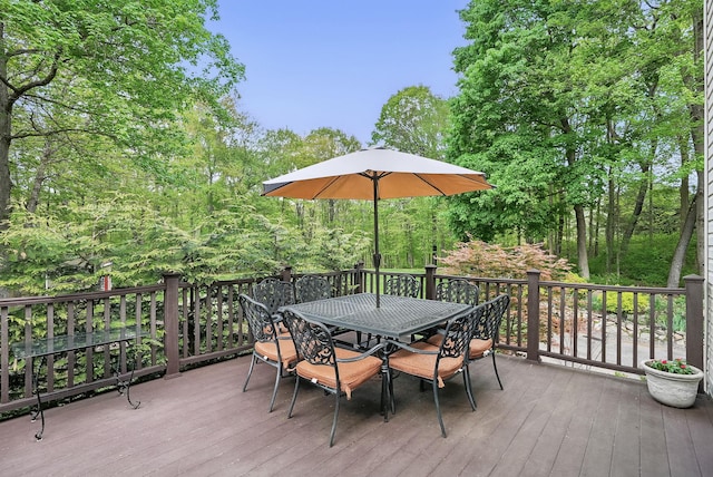 304 Church Rd, Putnam Valley, NY 10579 - wooden terrace with outdoor dining space and view of scattered trees