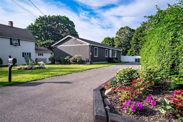 96 Grove St, Beacon, NY 12508 - view of front of property with a front lawn, driveway, and cooling unit