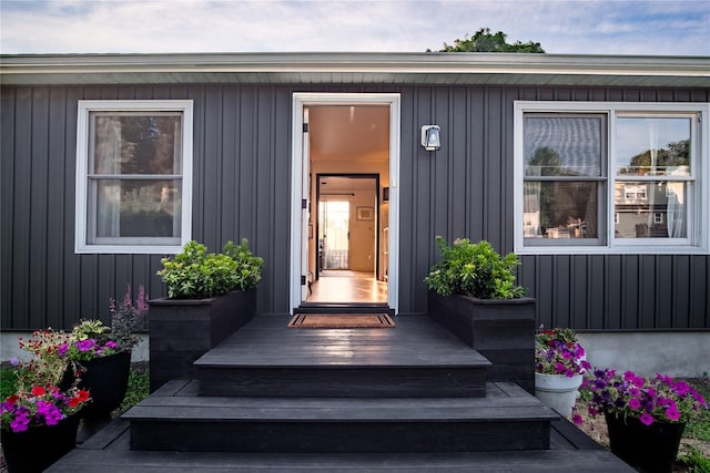 96 Grove St, Beacon, NY 12508 - doorway to property with board and batten siding