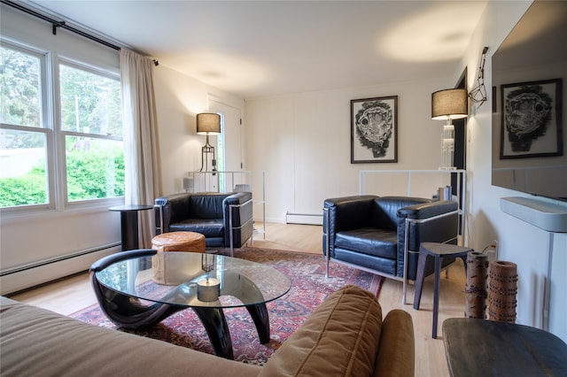 96 Grove St, Beacon, NY 12508 - living room with a baseboard heating unit and wood finished floors