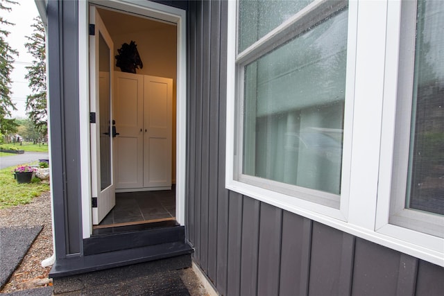 96 Grove St, Beacon, NY 12508 - doorway to property featuring board and batten siding