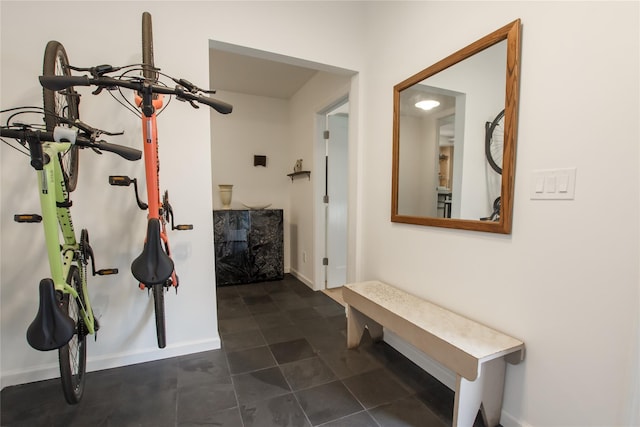96 Grove St, Beacon, NY 12508 - hall featuring baseboards and dark tile patterned flooring