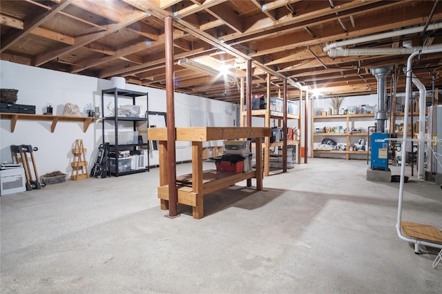 96 Grove St, Beacon, NY 12508 - unfinished below grade area with a heating unit and water heater