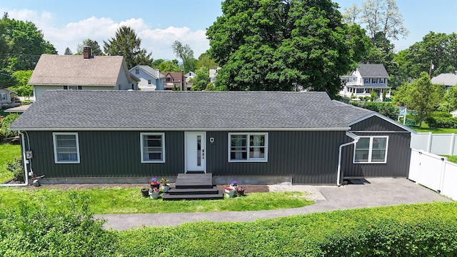 96 Grove St, Beacon, NY 12508 - view of front of home featuring a shingled roof and a patio area