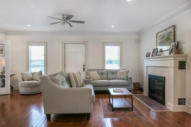 7 N Howells Point Rd, Bellport Village, NY 11713 - living room with healthy amount of natural light, dark wood finished floors, a fireplace, ceiling fan, and ornamental molding