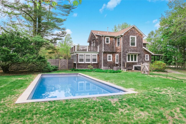 7 N Howells Point Rd, Bellport Village, NY 11713 - rear view of property featuring a balcony