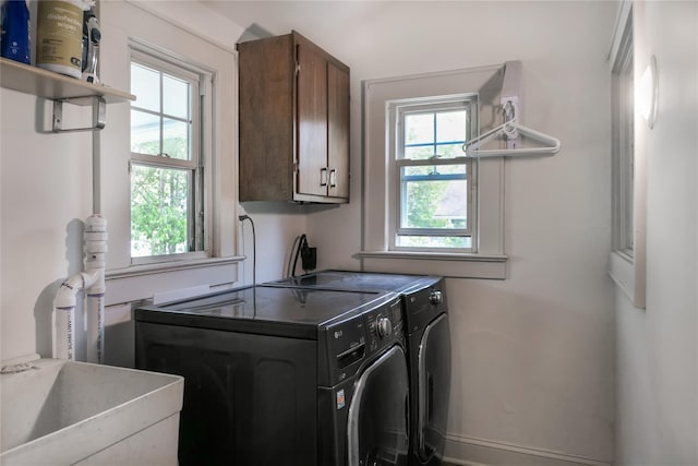 7 N Howells Point Rd, Bellport Village, NY 11713 - laundry room featuring cabinet space, plenty of natural light, and washer and dryer