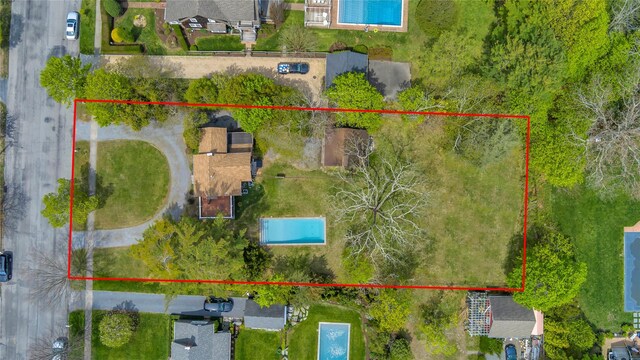 7 N Howells Point Rd, Bellport Village, NY 11713 - aerial overview of property's location featuring a pool area and property parcel outlined
