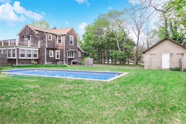 7 N Howells Point Rd, Bellport Village, NY 11713 - outdoor pool featuring a lawn and cooling unit
