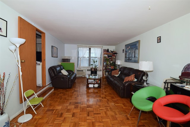 living room featuring baseboards