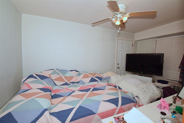 bedroom featuring ceiling fan