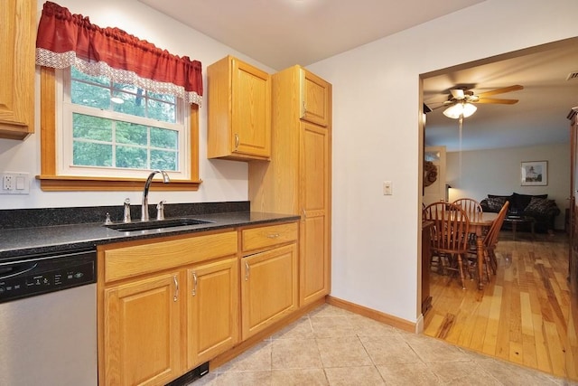 135 Cottage Rd, Carmel, NY 10512 - kitchen featuring dishwasher, a sink, a ceiling fan, light tile patterned floors, and baseboards