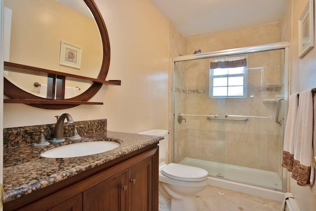 135 Cottage Rd, Carmel, NY 10512 - bathroom featuring toilet, tile patterned floors, a stall shower, and vanity