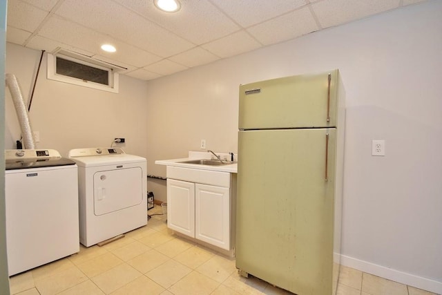 135 Cottage Rd, Carmel, NY 10512 - washroom featuring washer and dryer, light tile patterned floors, recessed lighting, and cabinet space