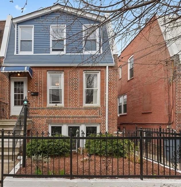 235 Quincy Ave, Bronx, NY 10465 - view of side of home featuring a fenced front yard and brick siding