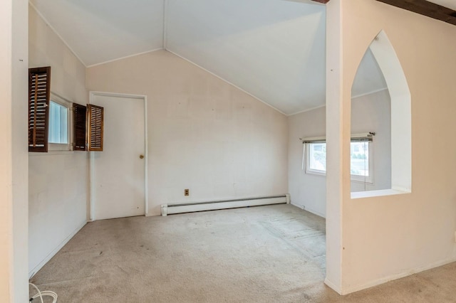 769 Anderson Ave, Franklin Square, NY 11010 - additional living space featuring a baseboard radiator, carpet flooring, vaulted ceiling, and arched walkways