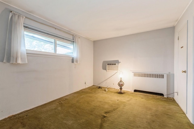 769 Anderson Ave, Franklin Square, NY 11010 - empty room featuring radiator, carpet floors, and an AC wall unit