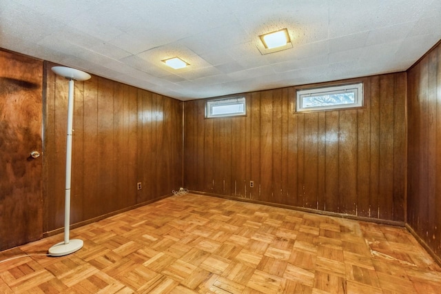 769 Anderson Ave, Franklin Square, NY 11010 - basement with wooden walls and baseboards