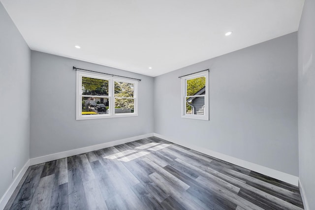 73 S Evergreen Dr, Selden, NY 11784 - empty room with baseboards, recessed lighting, and wood finished floors