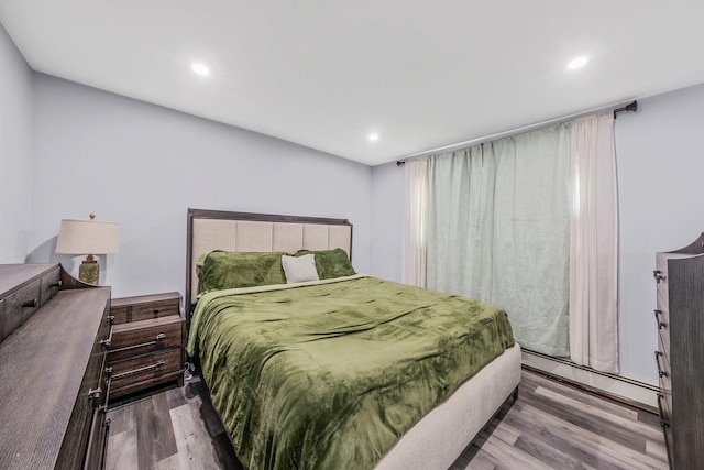 73 S Evergreen Dr, Selden, NY 11784 - bedroom featuring recessed lighting and wood finished floors