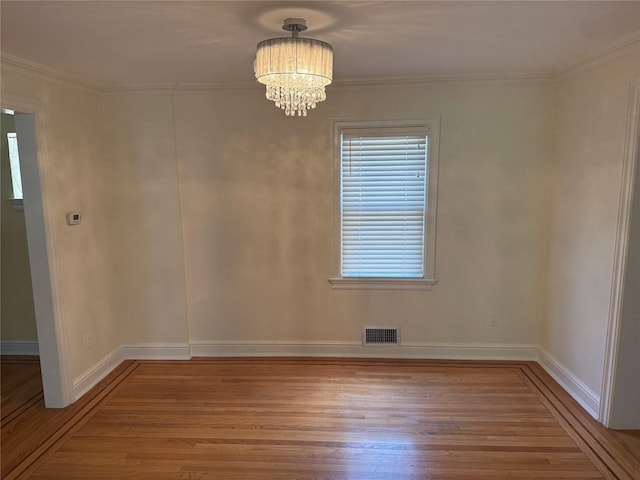 2330 Kingsland Ave, Bronx, NY 10469 - unfurnished dining area featuring wood finished floors, a chandelier, baseboards, and ornamental molding