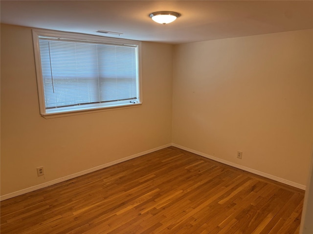 2330 Kingsland Ave, Bronx, NY 10469 - unfurnished room featuring wood finished floors and baseboards