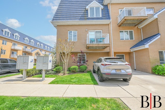 view of front of house featuring brick siding