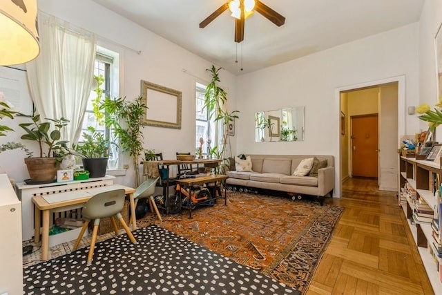 living room with ceiling fan