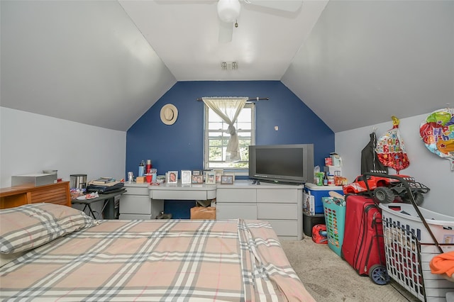 carpeted bedroom featuring vaulted ceiling and ceiling fan