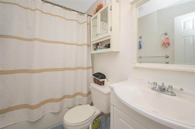 full bathroom with vanity and toilet