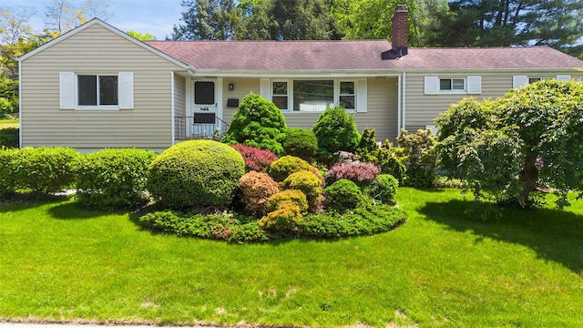 202 W Main St, Mount Kisco, NY 10549 - single story home featuring a chimney, a front lawn, and roof with shingles