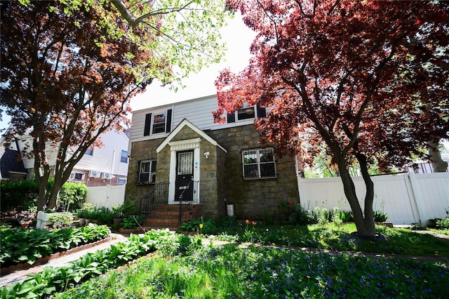 178-06 69th Ave, Fresh Meadows, NY 11365 - view of front facade featuring fence and stone siding