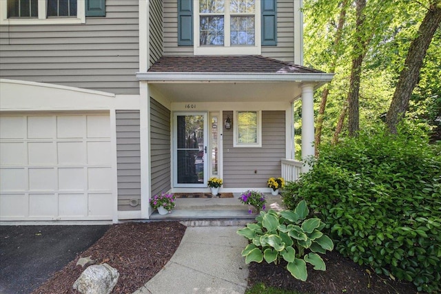1601 Pondcrest Ln, White Plains, NY 10607 - entrance to property with a porch, an attached garage, and a shingled roof