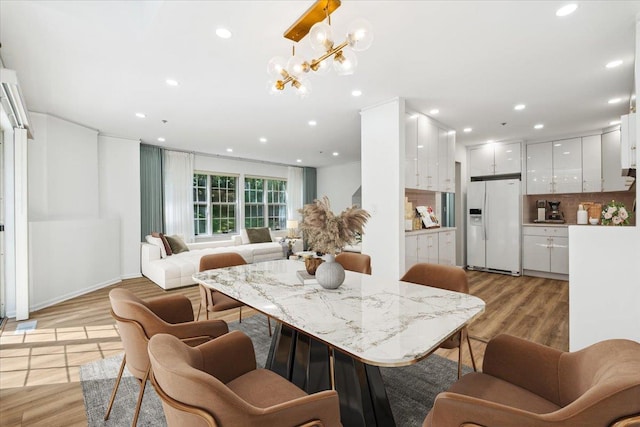 1601 Pondcrest Ln, White Plains, NY 10607 - dining space featuring recessed lighting, light wood-style flooring, and a chandelier