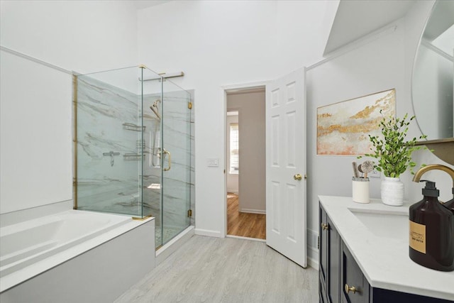1601 Pondcrest Ln, White Plains, NY 10607 - full bathroom featuring a marble finish shower, wood finished floors, a bath, vanity, and baseboards