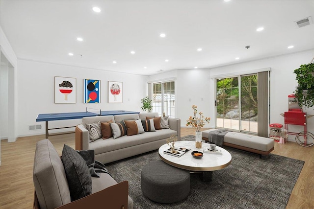 1601 Pondcrest Ln, White Plains, NY 10607 - living area with light wood-type flooring and recessed lighting