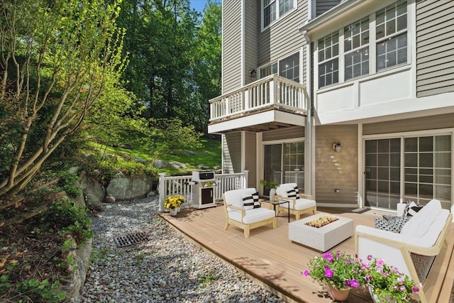 1601 Pondcrest Ln, White Plains, NY 10607 - wooden deck featuring an outdoor living space with a fire pit