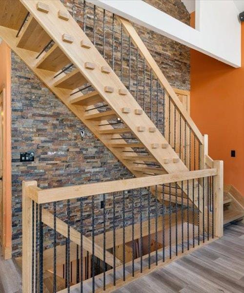 stairway with wood finished floors
